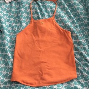 Orance crop top with little tree design in front